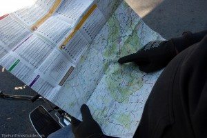 Jim is using our Smoky Mountains motorcycle map from Mad Maps on our first long-distance motorcycle ride. photo by Lynnette at TheFunTImesGuide.com