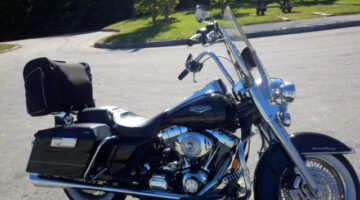 Our motorcycle with fully packed saddlebags and Harley luggage bag on the back. photo by Lynnette at TheFunTimesGuide.com