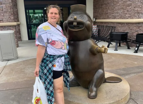 My wife poses with a Buc-ee beaver statue in front of the Buc-ee's location in Robertsdale, Alabama. 
