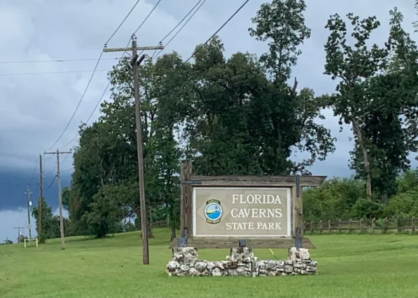 The Florida Caverns State Park sign greets visitors touring the caves in North Florida. 