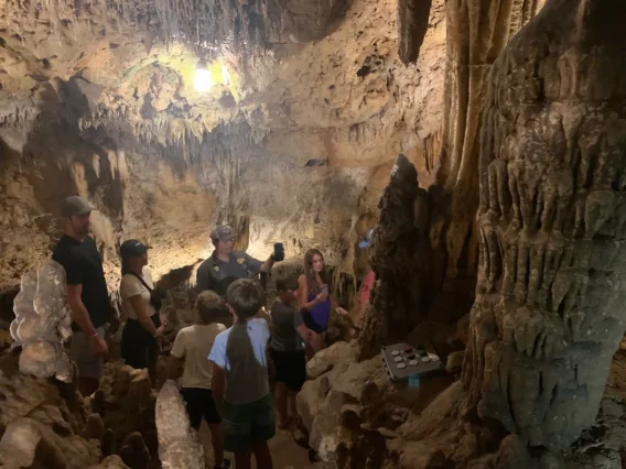 Tourists exploring Florida Caverns State Park in Marianna, where you can explore real caves.  