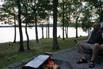 Jim enjoying the view of the lake while sitting at the campfire at Seven Points Campground.
