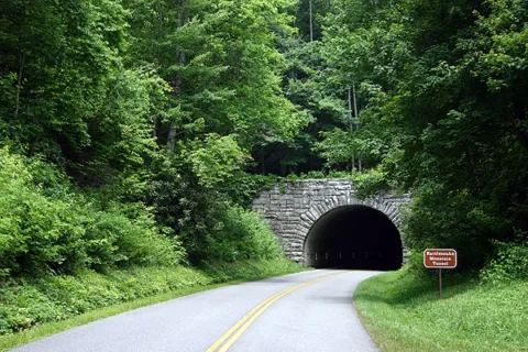 Approaching a dark tunnel on a dangerous mountain road - see how to use your brakes properly.
