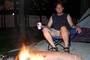 Jim hanging out by the campfire.