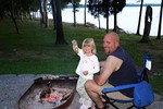 Sophie was Jim-the-cook's assistant all weekend. She helped with breakfast in the morning, and here she's making Smores with Jim.