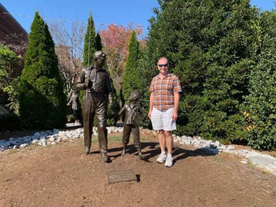 Here I am standing by statues of Andy Taylor and his son Opie, main characters from The Andy Griffith Show. 
