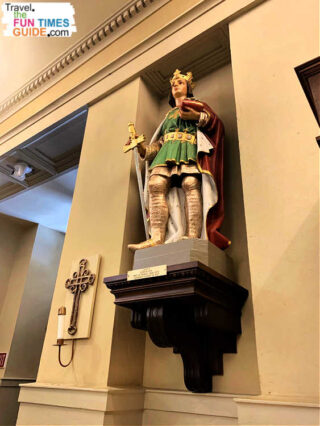 This is a church statue of King Louis of France -- the namesake of the New Orleans cathedral. He lived from 1214 through 1270 and was canonized a saint in 1297. 