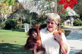 Lucie with Kera the baby orangutan she was hand-raising.