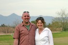 Jim and Lynnette at Hohokam Park for Spring Training baseball with the mountains in the background.