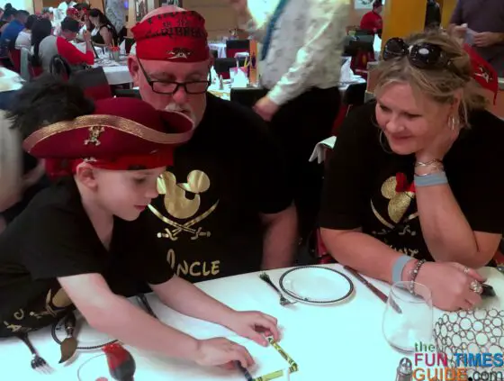 5-year-old Cam trying to repeat the magic tricks we learned at dinner on Disney Dream cruise.