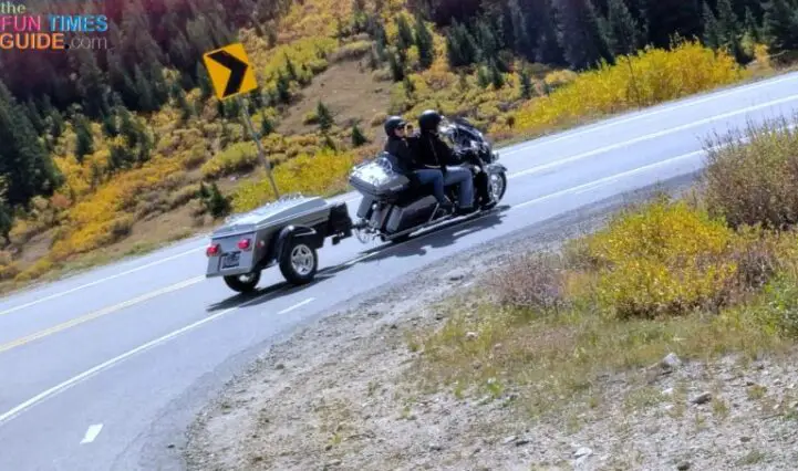 Kevin and Kay on their Harley CVO Ultra Limited pulling an American Legend motorcycle trailer.