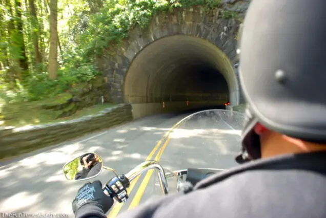 Enjoying the ride on our first multi-day motorcycle trip. This was a tunnel through the Smoky Mountains near Gatlinburg, TN. photo by Lynnette at TheFunTimesGuide.com