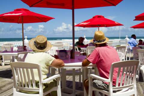 Enjoying the outdoor seating overlooking the ocean at Racing's North Turn Beachfront Bar & Grille in Ponce Inlet near Daytona Beach, Florida.