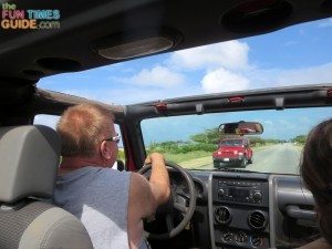 Driving down the road in a Jeep on the second of our Aruba vacations