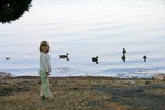 Sophie was fascinated with all the ducks that kept swimming by our campsite.