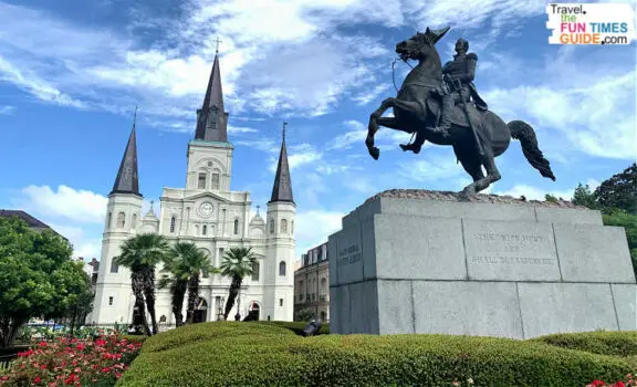 St. Louis Cathedral next to a statue of Andrew Jackson on a horse in Jackson Square -- New Orleans, Louisiana.