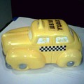 A yellow taxi cab bank Suzie bought as a souvenir from  our trip to NYC. Photo Ã‚Â©Suzie 2005.